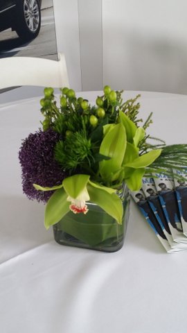 Purple flower and succulent arrangement